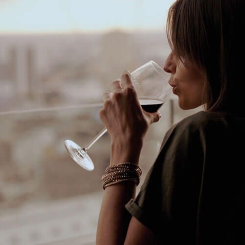 People tasting wines at a counter